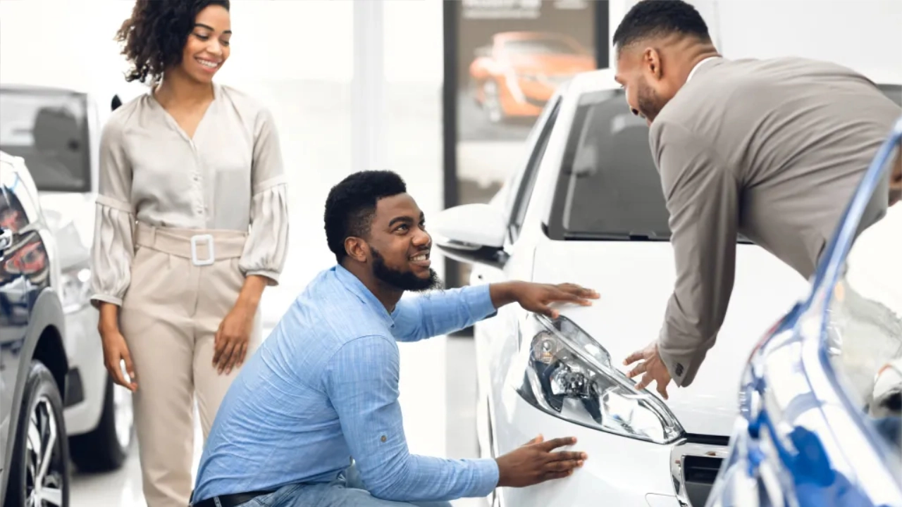 couple shopping for a vehicle in a dealership