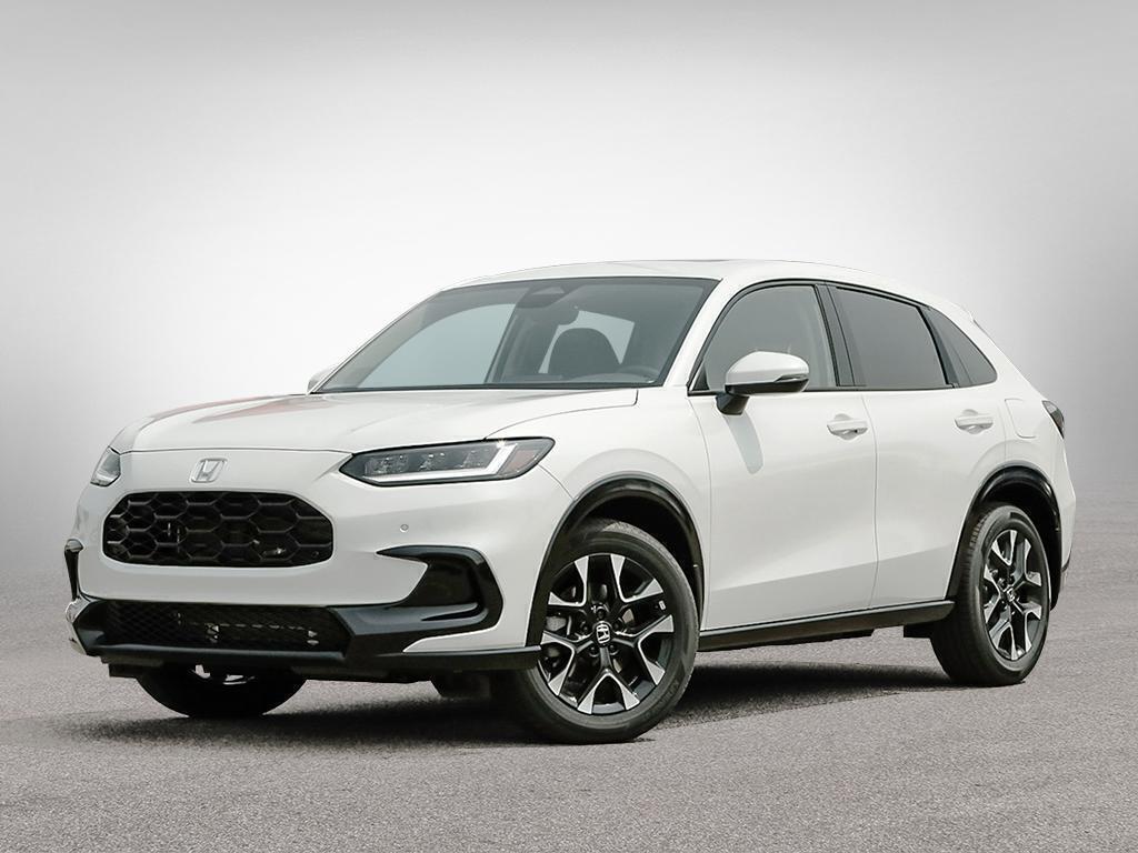 Vue avant latérale du Honda HR-V EX-L AWD 2026 en blanc platine nacré avec phares à DEL.