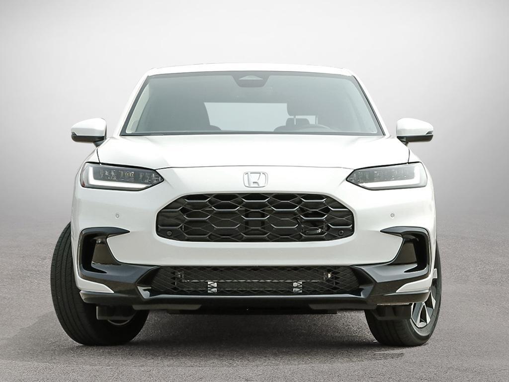 Face avant du Honda HR-V EX-L AWD 2026, calandre noire et éclairage moderne.