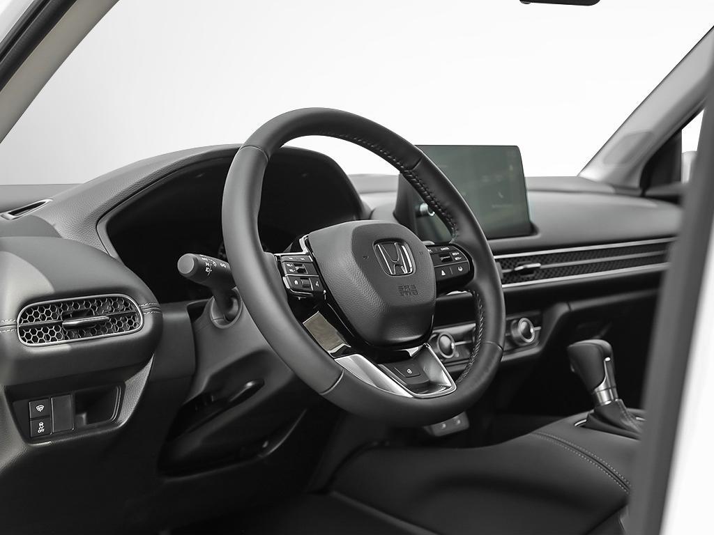 Poste de conduite du HR-V EX-L AWD 2026 avec écran tactile et finitions modernes.