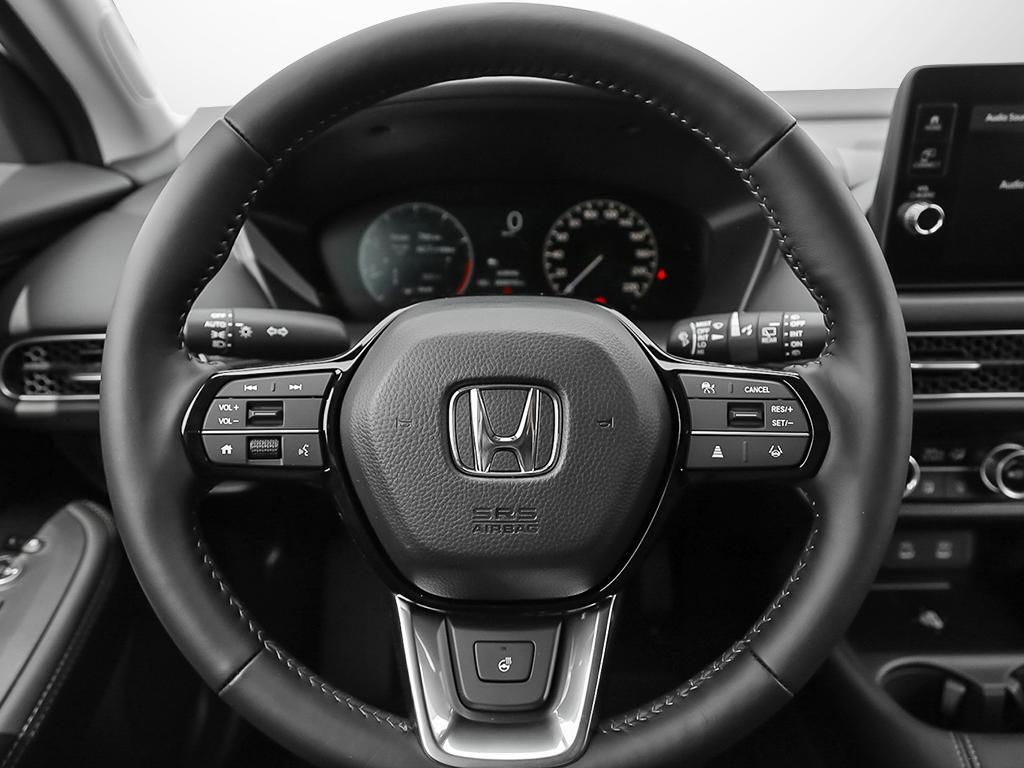 Volant multifonction en cuir du HR-V EX-L AWD 2026 avec commandes intégrées.