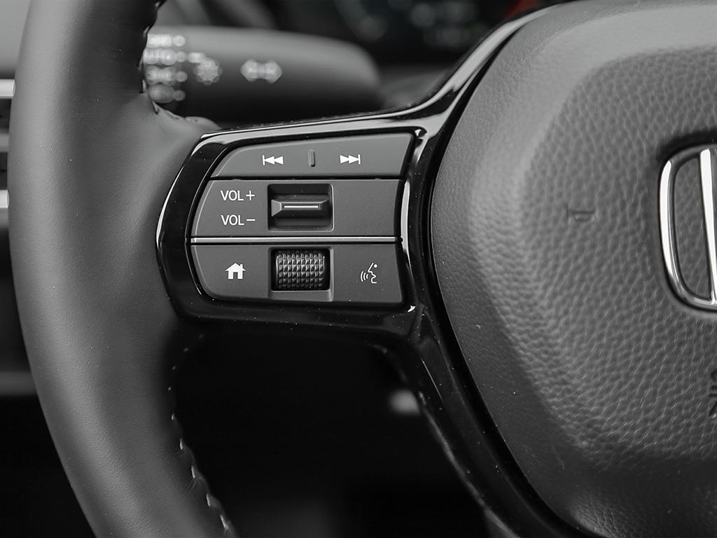 Commandes audio sur le volant du HR-V EX-L AWD 2026.