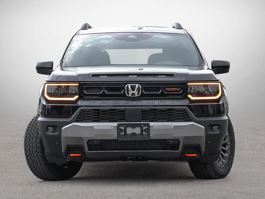 2026 Honda Passport TrailSport AWD in black, front view on the road