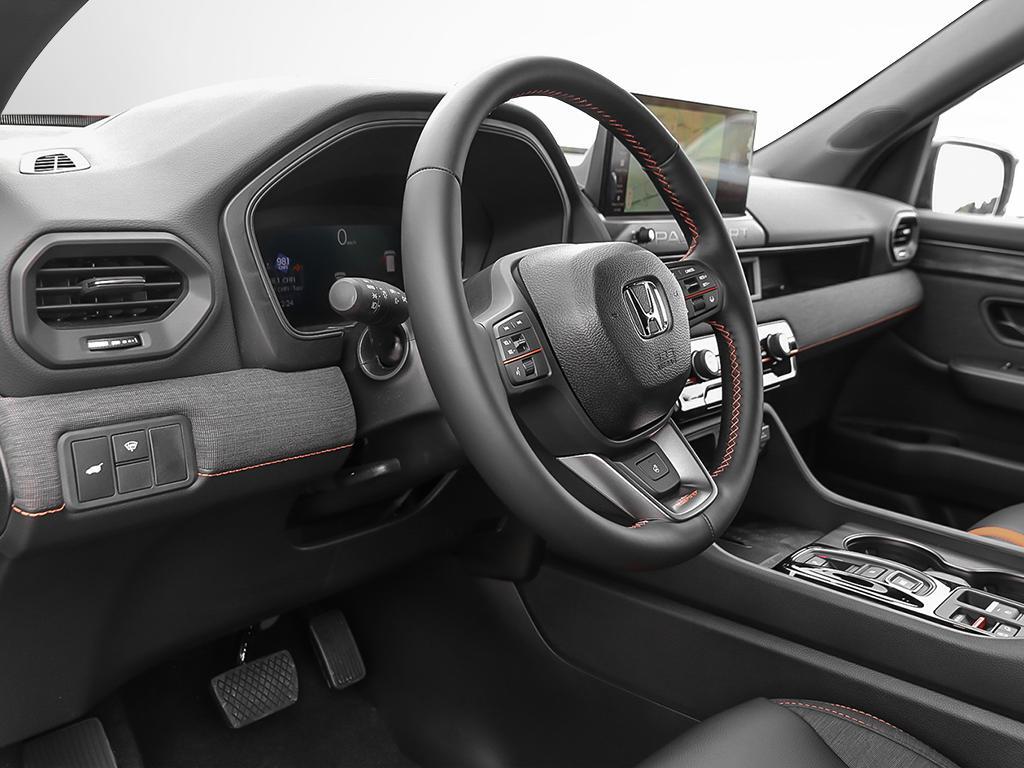 2026 Honda Passport TrailSport AWD in black, interior view of the driver’s cockpit