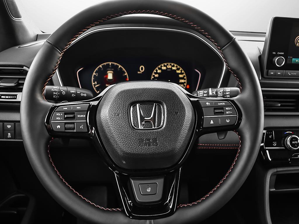 Honda Pilot Sport AWD 2025 intérieur, gros plan sur le volant multifonction