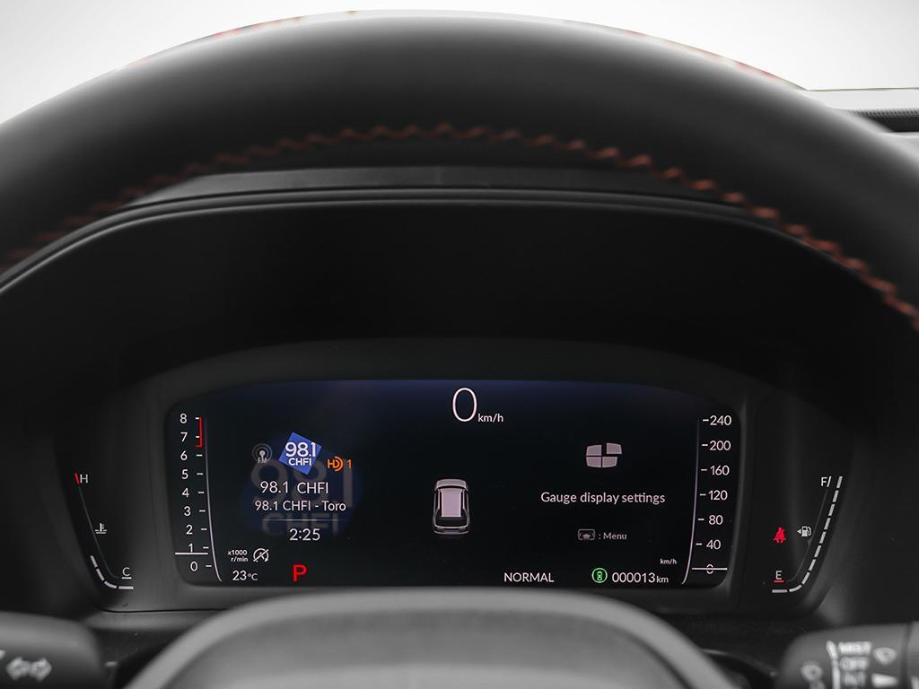 2026 Honda Passport TrailSport AWD in black, close-up of digital dashboard