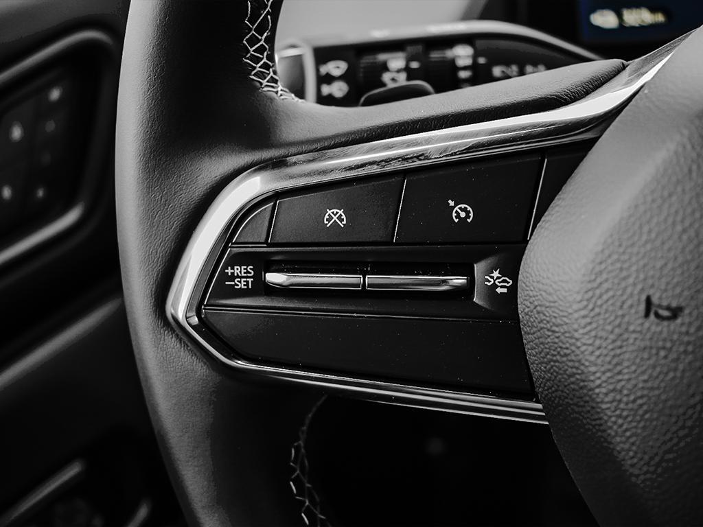 Cruise control buttons close-up on steering wheel of 2025 Honda Prologue EX-L