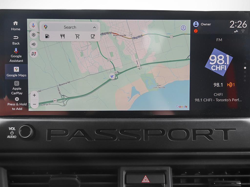 2026 Honda Passport TrailSport AWD in black, close-up of integrated GPS screen