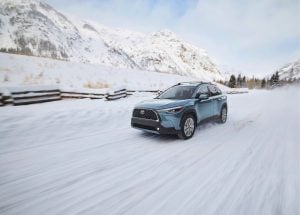 2023 Corolla Cross on the road in winter