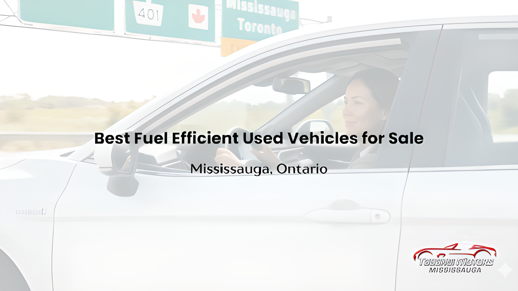 Woman driving a hybrid vehicle towards the Mississauga exit